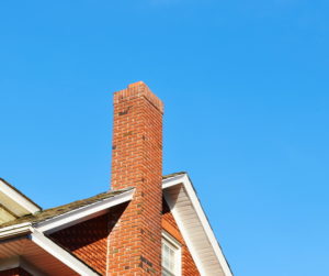 chimney on house against blue sky